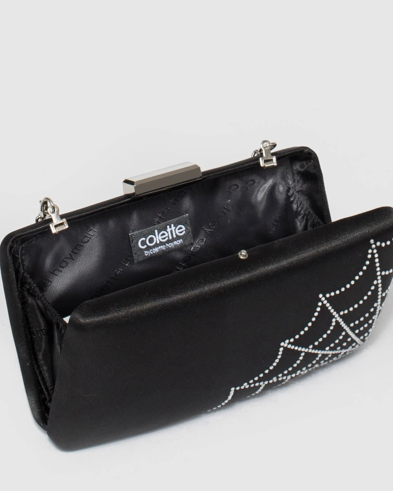 Black Bellatrix Web Hardcase Clutch Bag